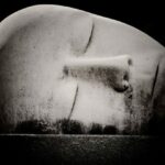 Sculpture of a face.