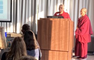 Female monastics Tenzin Dadon and Karma Tashi Chodron are seen presenting at 2024's Heartwood-Northwestern Symposium.